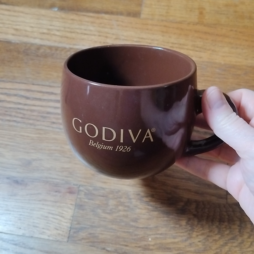 Godiva Coffee Cup Brown and says Godiva Belgium 1926 in Gold letters